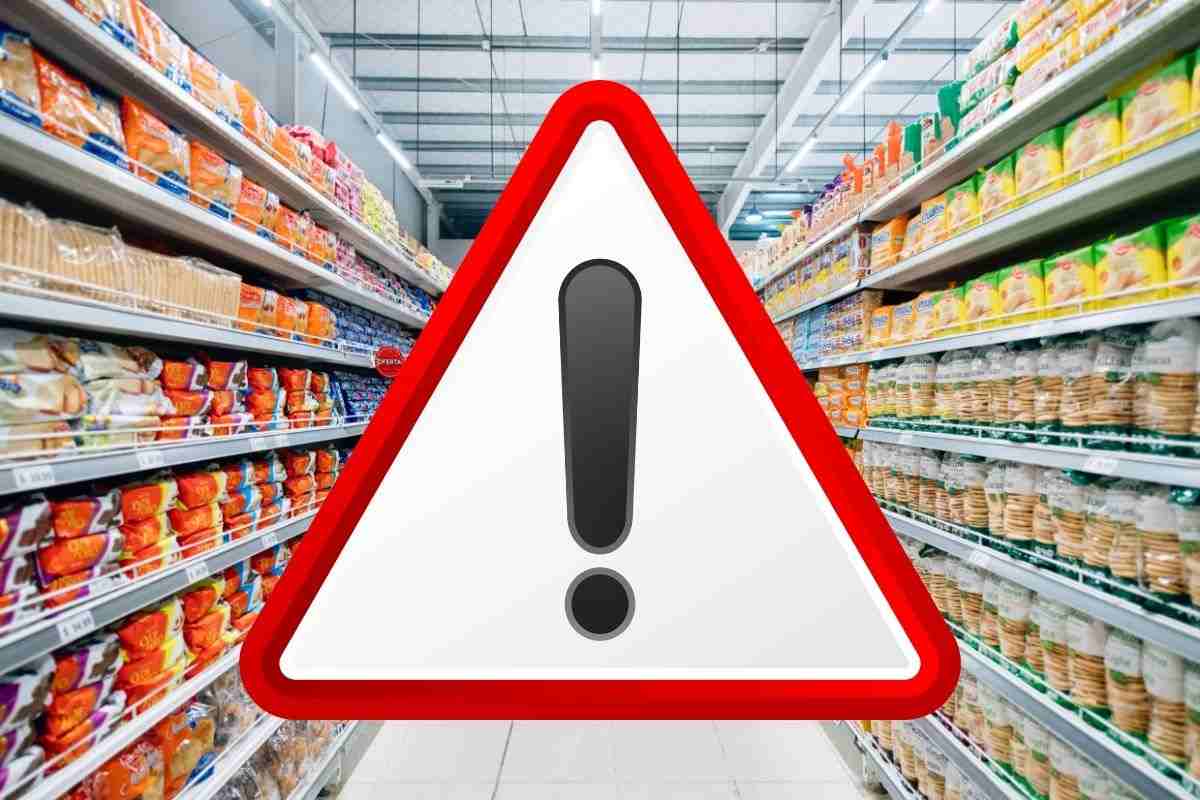 corsia supermercato e segnale di pericolo