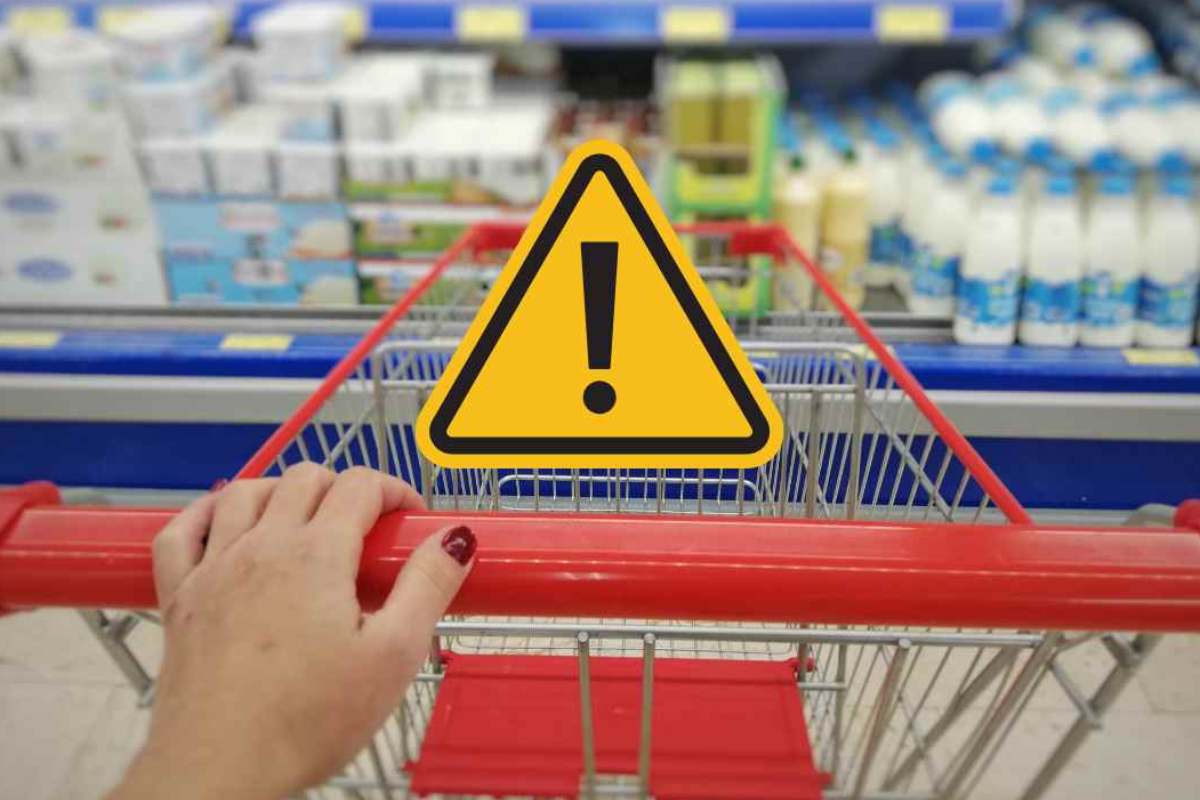 Carrello della spesa e simbolo di pericolo