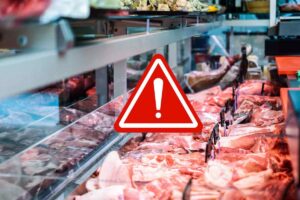 Banco carne e segnale pericolo